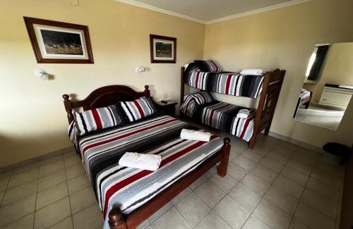 Macachin Hotel | Hostería COPAHUE