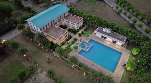 Faridabad Villa | Hostie Petunia-2BHK Farm House 40Mins from Gurgaon-Delhi
