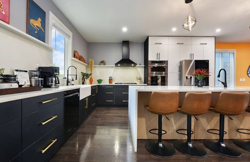 Lower Lawrenceville House | ★ HostWise Stays ★ Luxe Kid-Friendly Home with Rooftop deck, Garage, High End Kitchen, More!