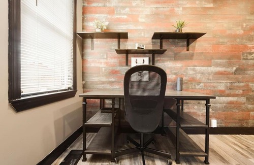 Lawrenceville House | HostWise Stays - Prime Location in Lawrenceville, Exposed Brick 2BR Home