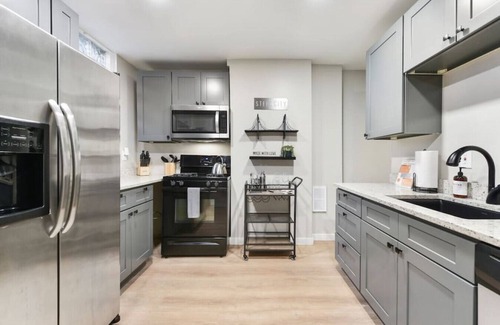 Lower Lawrenceville House | ★ HostWise Stays ★ Stunning Remodel, Off-Street Parking, Amazing Location!
