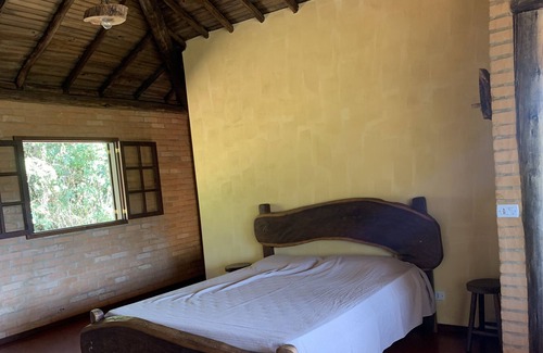 Conceicao do Ibitipoca Ski Chalet | Hot tub and a unique view of the Arraial and the Park within the Alto da Colina Reserve