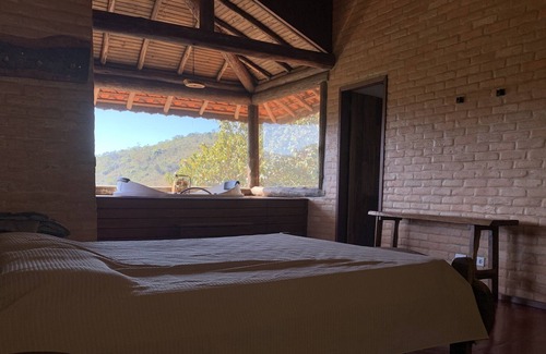 Conceicao do Ibitipoca Ski Chalet | Hot tub and a unique view of the Arraial and the Park within the Alto da Colina Reserve