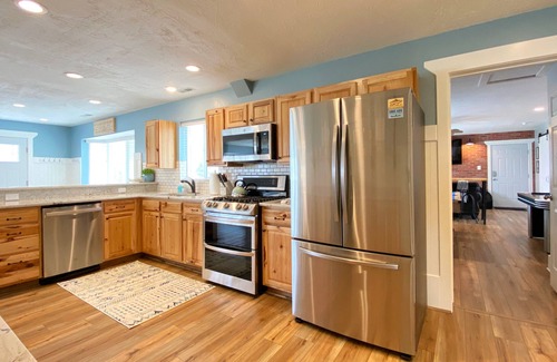 Garden City House | Hot Tub, Game Room, Only 2 Blocks from the Lake!