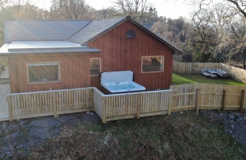 Taynuilt House | Hot tub lodge with stunning view
