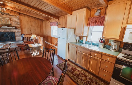 Heltonville Cabin | Hot tub overlooking Lake Monroe. Pet Friendly!