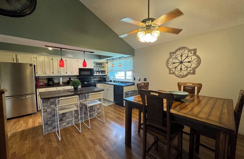 Wichita House | Hot Tub - Pool Table - Fire Pit - Family Friendly! Hosted by Homes by CNJ.