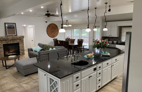Garland House | Hot Tub & Private Lake Modern Country Oasis in Heart of City