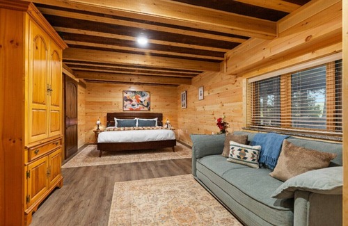 Newaygo House | Hot Tub, Water Amenities, Lakeshore Cottage