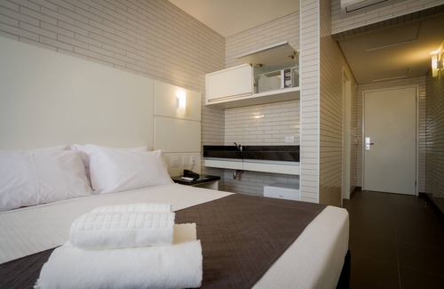 Bigorrilho Hotel | Hotel Confiance Barigui