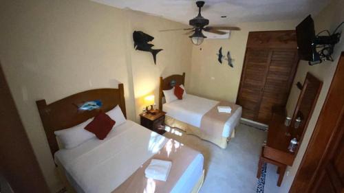 Punta Allen Apartment | Hotel Fisherman lodge, cuarto base triple