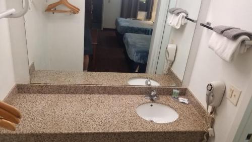 Stillwater Apartment | Hotel King Bed Hotel Room 110 Wi-Fi Booking
