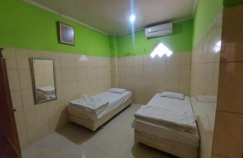 Kendari Hotel | Hotel Mulia Kendari Mitra RedDoorz
