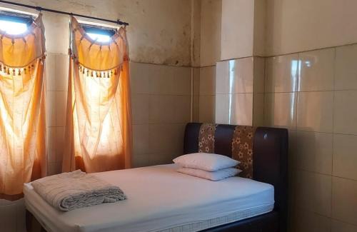 Kendari Hotel | Hotel Mulia Kendari Mitra RedDoorz
