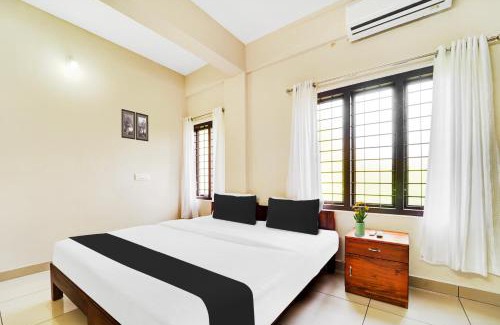 Kochi Hotel | Hotel O Ambalamedu