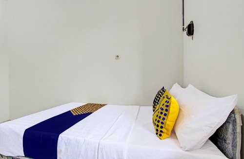 Pati Hotel | Hotel O Kristin Homestay