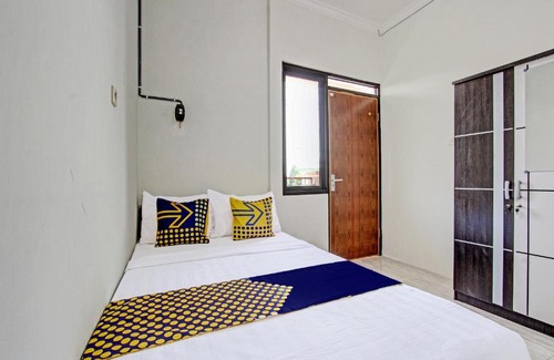 Pati Hotel | Hotel O Kristin Homestay