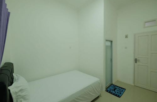 Palopo Hotel | Hotel O Qq Kost Near Pantai Kebesaran Beach