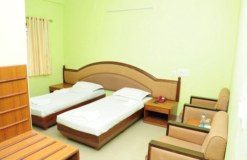 Gonikoppal Hotel | Hotel Pranav International