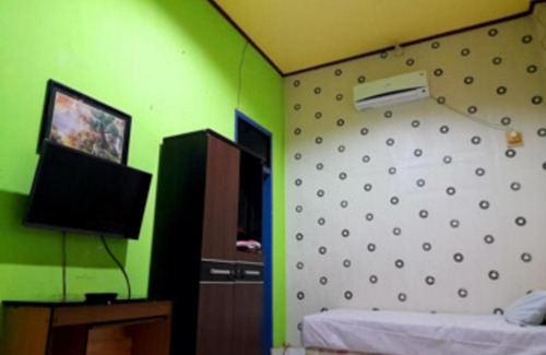 Buton Babau Hotel | Hotel Rosichan Bau Bau Mitra RedDoorz
