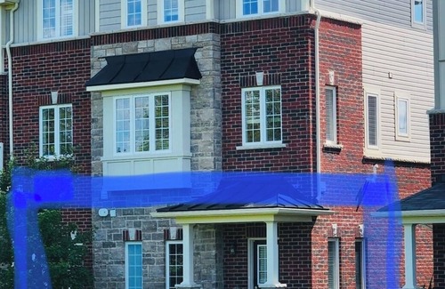 Guelph House | Hotel style private main level if townhome