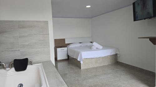 Sevilla Hotel | Hotel Valle del Café - Habitación con Jacuzzi 10