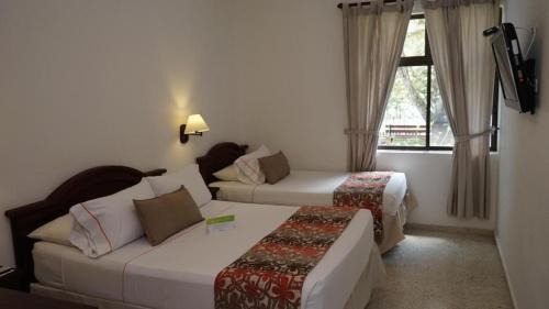 Calima Hotel | Hotel y Cabañas - Centro Vacacional Comfandi Lago Calima