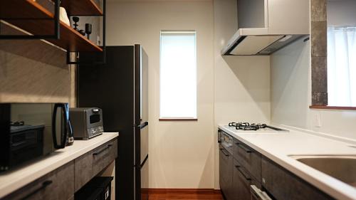 Nishi Hotel | HOTELHOUSE Nekogoya Hachiken 八軒