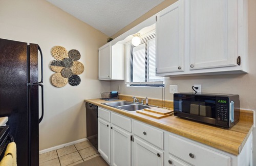 Wichita House | HotTub, Theater, Kings, & Firepit - NearWesley