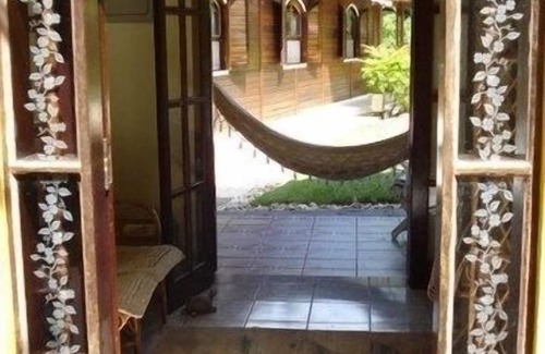 Prumirim House | House, 8 people, 5 bedrooms, 4 bathrooms. Open cond, concierge, 24-hour rounds.