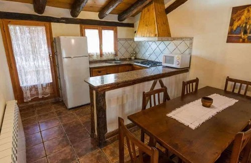 Beceite Apartment | House Ana III. Attic terrace and fireplace