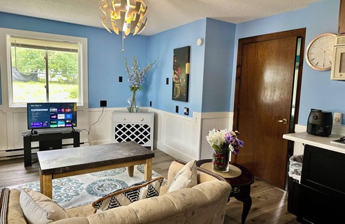 Biddeford Apartment | House dwelling that combines The bedroom kitchen and living area into one space