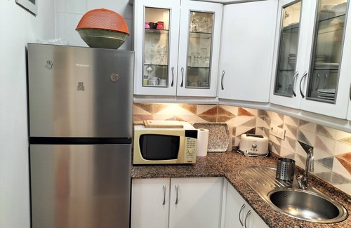 San Juan de los Terreros House | House with terrace of flowers and solarium, near beaches, A/C, wifi, Sat TV, BBQ