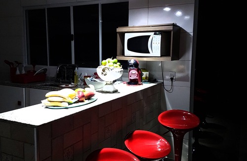 Portinho House | House in Ilhabela overlooking the green