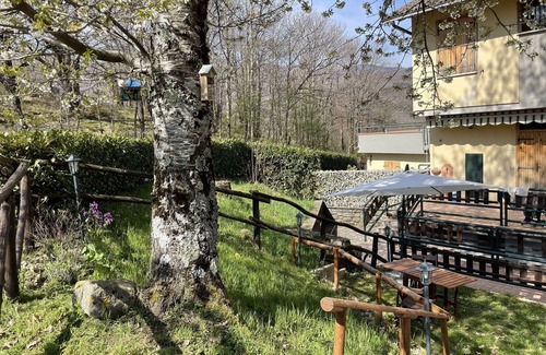 Doganaccia House | House in the green in Cutigliano