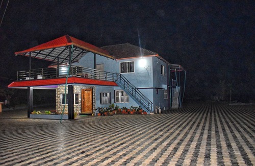 Koppa Other | House in the hill homestay homestay is located on the hilltop .
