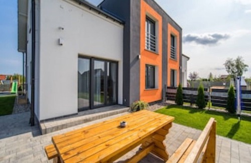 gmina Wolin House | House KATAMARAN 4 Bedrooms Baltic Sea Sea view Garden Barbecue W-Lan Playground Fishing