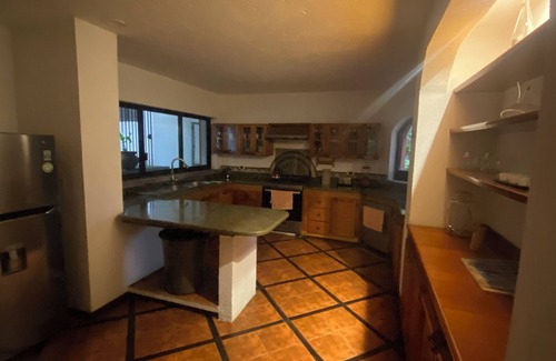 Puebla Villa | House among trees.