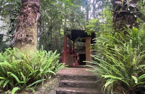 Puebla Villa | House among trees.