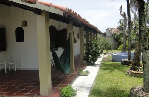 Praia da Vila House | House surrounded porch, 4 bedrooms, pool, barbecue and volleyball court