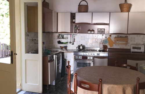 Santa Maria del Mare House | House with garden on the sea, the beach below