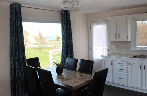 Saint-Joseph-de-Kent House | House with multi-level deck and water views in Bouctouche