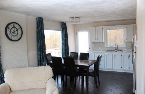 Saint-Joseph-de-Kent House | House with multi-level deck and water views in Bouctouche