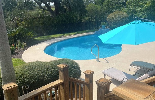 St. Simons Island House | house with pool in nature on the marsh. located at north side of the island.