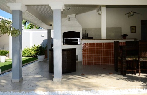 Balneario Praia do Pernambuco House | House with pool, jacuzzi, in Jardim Acapulco-Guaruja condominium