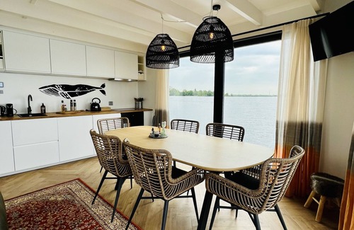 Oud Ade Boat Rental | Houseboat: "De Walvis" with tender. 6p 4+ 2 kids