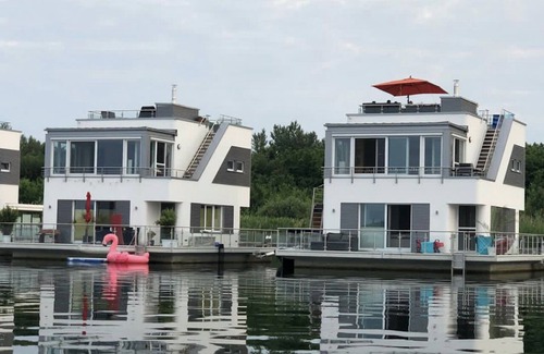 Bitterfeld Boat Rental | Houseboat "ELANDI" - relaxation, fun & luxury