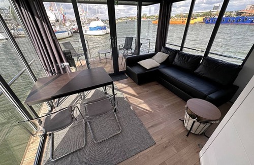 Lundby Boat Rental | Houseboat GREBBESTAD with roof terrace in the heart of Gothenburg