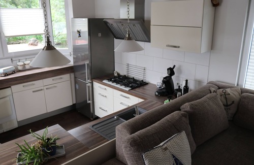 Roermond Boat Rental | Houseboat in the middle between AreaX and Outlet nevertheless pure nature