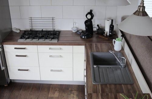 Roermond Boat Rental | Houseboat in the middle between AreaX and Outlet nevertheless pure nature
